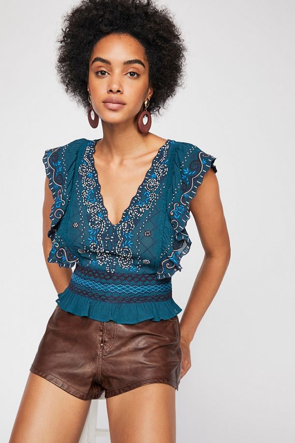 Gorgeous embroidered top with ruffled sleeves