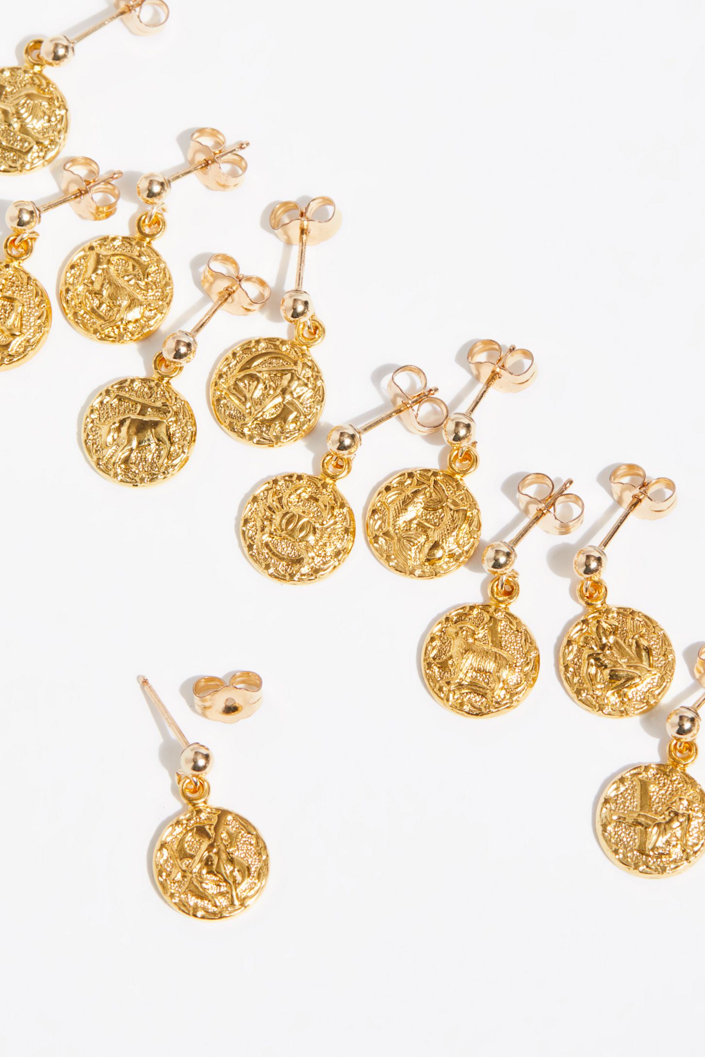 Slide View 1: Tiny Single Astrology Earring