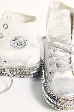 white studded sneakers